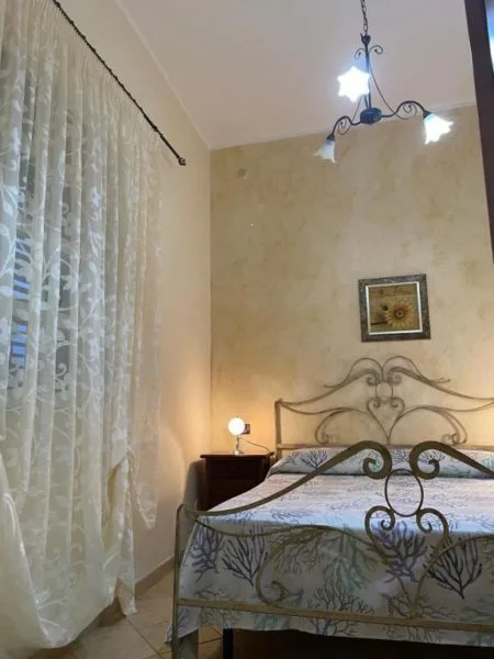 Letto o letti in una camera di La casa di Giovanna